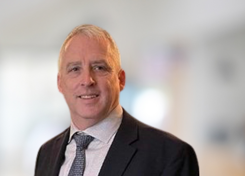 A headshot of Andy Fitzgerald
