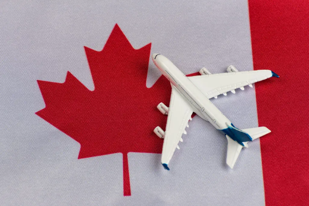 Flag of Canada and model airplane.